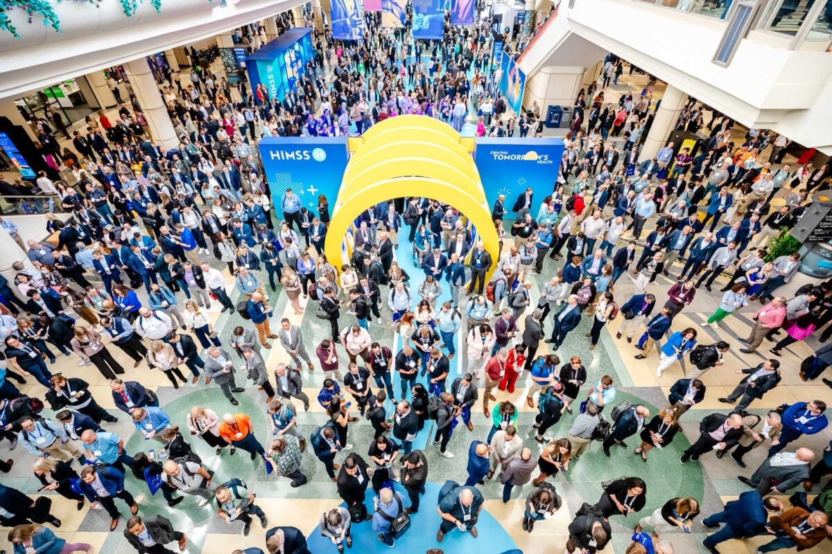 Aerial view of attendees gathered at the HIMSS Global Health Conference & Exhibition entrance.