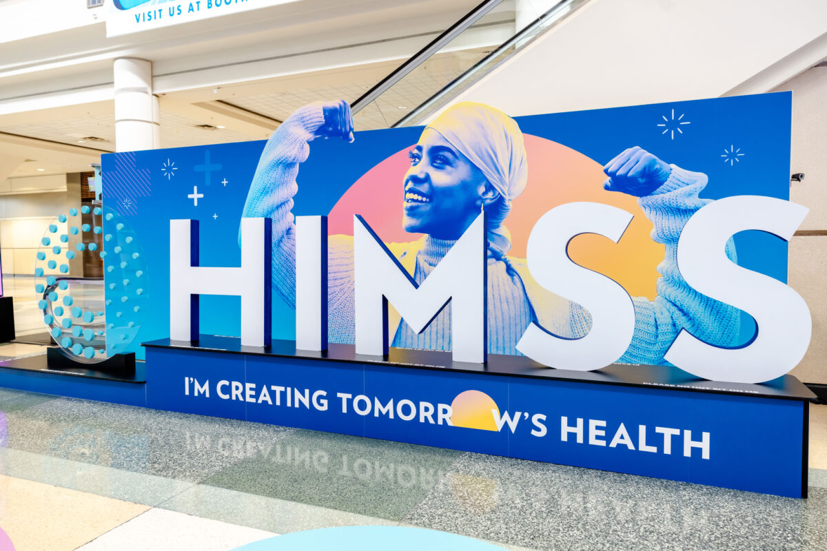 Healthcare leaders discussing digital transformation at HIMSS25 conference