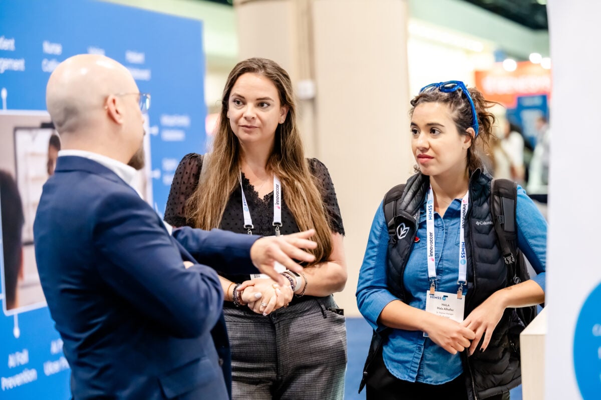 Attendees exploring innovative solutions at the HIMSS25 First-Time Exhibitors Pavilion.